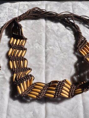 Belt Women's Bohemian boho-style tribal style belt features brown knotted macram
